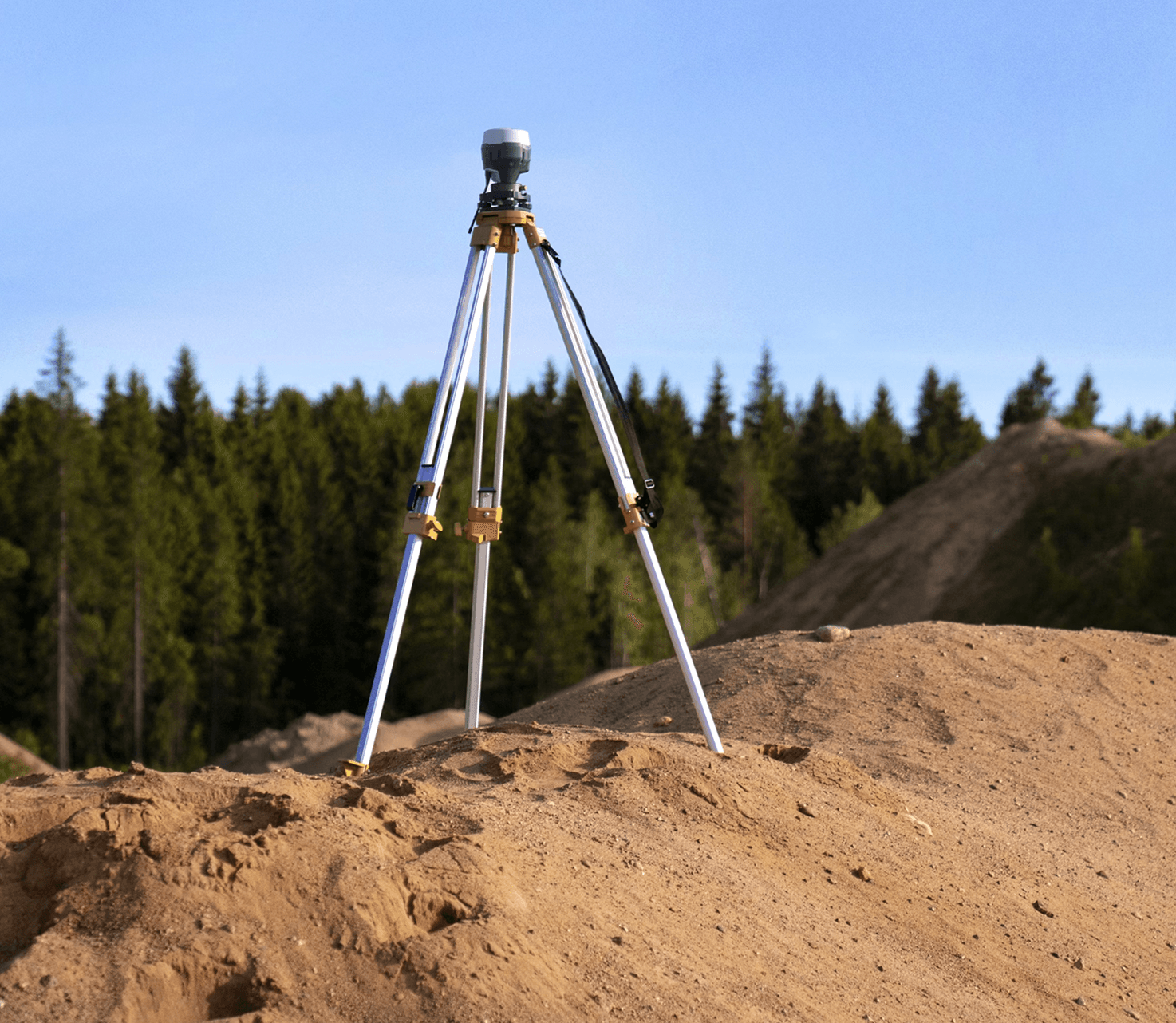 Surveying tripod equipment on construction site